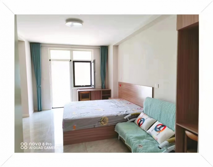 交运出站口有带院公寓出租,租金1200一月,家具家电齐全